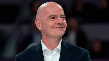 (FILES) International Association Football Federation (FIFA) President Gianni Infantino looks on at the end of the women�s singles final match, at the Qatar Open tennis tournament in Doha on February 14, 2026. FIFA President Gianni Infantino is �very calm� about Mexico hosting the 2026 World Cup, he told AFP on February 24, 2026, after the country faced a wave of violence following the death of its biggest drug lord. (Photo by Karim JAAFAR / AFP)