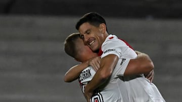 River Plate's midfielder Ignacio Fernandez (R) celebrates with his teammate forward Lucas Beltran after scoring against Union during their Argentine Professional Football League Tournament 2023 match at El Monumental stadium, in Buenos Aires, on March 31, 2023. (Photo by LUIS ROBAYO / AFP) (Photo by LUIS ROBAYO/AFP via Getty Images)