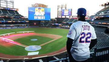 NEW YORK, NEW YORK - DECEMBER 12: Juan Soto of the New York Mets poses with his new uniform after his introductory press conference at Citi Field on December 12, 2024 in New York City. Al Bello/Getty Images/AFP (Photo by AL BELLO / GETTY IMAGES NORTH AMERICA / Getty Images via AFP)