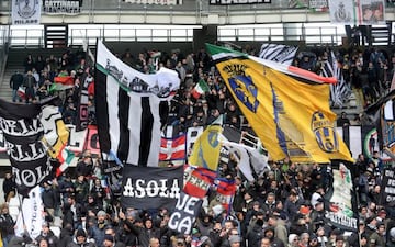 Soccer Football - Serie A - Torino vs Juventus - Stadio Olimpico Grande Torino, Turin, Italy - February 18, 2018 Juventus fans wave flags and display banners before the match