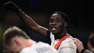 Luton Town's English striker #11 Elijah Adebayo gestures to fans on the pitch after the English Premier League football match between Burnley and Luton Town at Turf Moor in Burnley, north-west England on January 12, 2024. The game finished 1-1. (Photo by Oli SCARFF / AFP) / RESTRICTED TO EDITORIAL USE. No use with unauthorized audio, video, data, fixture lists, club/league logos or 'live' services. Online in-match use limited to 120 images. An additional 40 images may be used in extra time. No video emulation. Social media in-match use limited to 120 images. An additional 40 images may be used in extra time. No use in betting publications, games or single club/league/player publications. / 