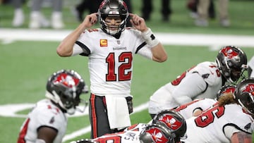 DETROIT, MICHIGAN - DECEMBER 26: Tom Brady #12 of the Tampa Bay Buccaneers at the line of scrimmage during the second quarter of a game against the Detroit Lions at Ford Field on December 26, 2020 in Detroit, Michigan.   Leon Halip/Getty Images/AFP
 == FO