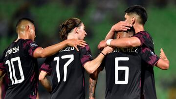 Mexico's Erick Sanchez (R) celebrates his goal against Suriname with his teammates during their Concacaf Nations League football match between Mexico and Suriname at TSM stadium in Torreon, State of Coahuila, Mexico on June 11, 2022. (Photo by ALFREDO ESTRELLA / AFP)