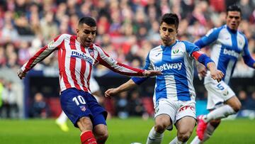 Bustinza, en una acción del Atlético-Leganés junto a Correa.
