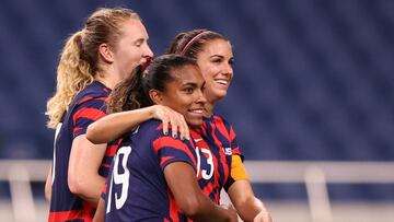 Tokyo 2020 Olympics - Soccer Football - Women - Group G - New Zealand v United States - Saitama Stadium, Saitama, Japan - July 24, 2021. Alex Morgan of the United States celebrates scoring their fifth goal with teammates REUTERS/Molly Darlington