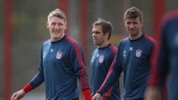 Bastian Schweinsteiger, Philipp Lahm and Thomas Muller durante un entrenamiento. 