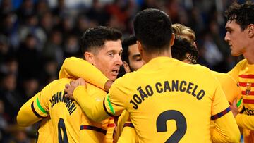Barcelona's Polish forward #09 Robert Lewandowski celebrates scoring the opening goal during the Spanish league football match between Deportivo Alaves and FC Barcelona at the Mendizorroza stadium in Vitoria on February 3, 2024. (Photo by Ander Gillenea / AFP)