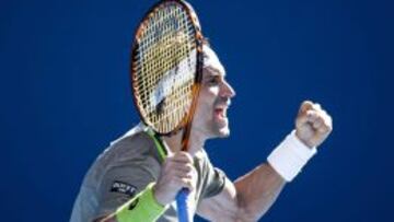 David Ferrer celebra el triunfo ante Mayer.