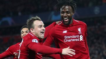 LIVERPOOL, ENGLAND - MAY 07: Divock Origi of Liverpool (27) celebrates as he scores his team's fourth goal with Xherdan Shaqiri and team mates during the UEFA Champions League Semi Final second leg match between Liverpool and Barcelona at Anfield on