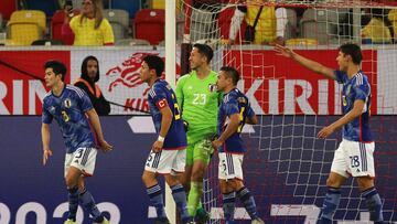 Soccer Football - International Friendly - Ecuador v Japan - Merkur Spielarena, Dusseldorf, Germany - September 27, 2022 Japan's Daniel Schmidt celebrates with team mates after saving a penalty from Ecuador's Enner Valencia REUTERS/Thilo Schmuelgen