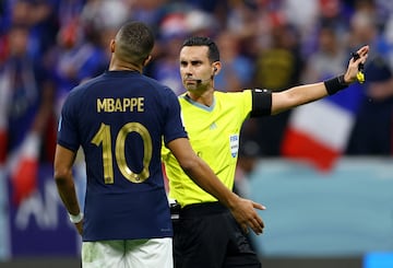 FIFA World Cup Qatar 2022 - Semi Final - France v Morocco
Referee Cesar Ramos signals to Kylian Mbappé.