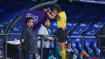 Referee Karen Hernandez review a play in the VAR during the 10th round match between Cruz Azul and Queretaro as part of the Liga BBVA MX, Torneo Apertura 2025 at Olimpico Universitario Stadium, on September 24, 2025 in Mexico City, Mexico.