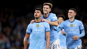 Manchester (United Kingdom), 23/10/2024.- Matheus Nunes (L) of Manchester City celebrates with teammates after scoring the 5-0 goal from the penalty spot during the UEFA Champions League match between Manchester City and Sparta Prague in Manchester, Britain, 23 October 2024. (Liga de Campeones, Reino Unido, Praga) EFE/EPA/ADAM VAUGHAN