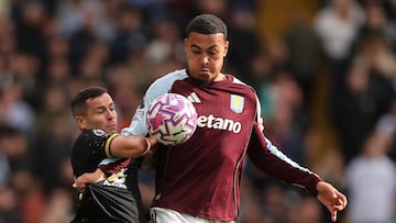 Soccer Football - Premier League - Aston Villa v Burnley - Villa Park, Birmingham, Britain - October 5, 2025 Burnley's Josh Cullen in action with Aston Villa's Morgan Rogers REUTERS/David Klein EDITORIAL USE ONLY. NO USE WITH UNAUTHORIZED AUDIO, VIDEO, DATA, FIXTURE LISTS, CLUB/LEAGUE LOGOS OR 'LIVE' SERVICES. ONLINE IN-MATCH USE LIMITED TO 120 IMAGES, NO VIDEO EMULATION. NO USE IN BETTING, GAMES OR SINGLE CLUB/LEAGUE/PLAYER PUBLICATIONS. PLEASE CONTACT YOUR ACCOUNT REPRESENTATIVE FOR FURTHER DETAILS..
