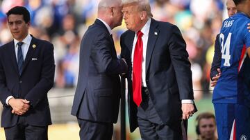 EAST RUTHERFORD, NEW JERSEY - JULY 13: Gianni Infantino, President of FIFA, and U.S. President Donald Trump shake hands during the award ceremony following the FIFA Club World Cup 2025 Final match between Chelsea FC and Paris Saint-Germain at MetLife Stadium on July 13, 2025 in East Rutherford, New Jersey. Buda Mendes/Getty Images/AFP (Photo by Buda Mendes / GETTY IMAGES NORTH AMERICA / Getty Images via AFP)