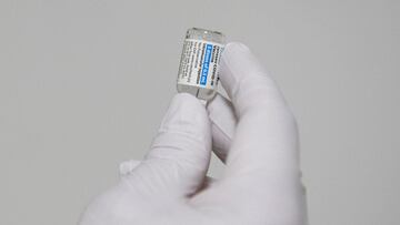 A syringe is filled with a dose of the Johnson &amp; Johnson Janssen Covid-19 vaccine at a vaccination site organized by the United Farm Workers (UFW), Kern Medical, the Kern County Latino Covid-19 Task Force inside Reuther Hall at Forty Acres on March 13