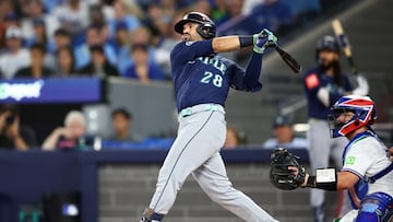 TORONTO, ONTARIO - OCTOBER 20: Eugenio Suarez #28 of the Seattle Mariners hits a single during the second inning against the Toronto Blue Jays in game seven of the American League Championship Series at the Rogers Centre on October 20, 2025 in Toronto, Ontario. Vaughn Ridley/Getty Images/AFP (Photo by Vaughn Ridley / GETTY IMAGES NORTH AMERICA / Getty Images via AFP)