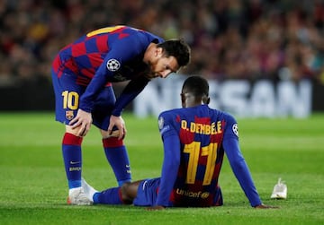 Lionel Messi speaks to Dembélé after the Frenchman picked up another injury against Dortmund.