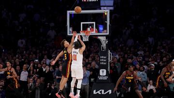 Jalen Brunson #11 of the New York Knicks takes the game winning shot as Dyson Daniels #5 of the Atlanta Hawks defends at Madison Square Garden on February 12, 2025 in New York City. The New York Knicks defeated the Atlanta Hawks 149-148 in overtime.