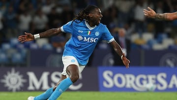 Napoli's Camerunese midfielder #99 Andre-Frank Anguissa celebrates after scoring a goal during the Italian Serie A football match SSC Napoli vs Cagliari Calcio on August 30, 2025 at the Diego Armando-Maradona stadium. (Photo by CARLO HERMANN / AFP)
