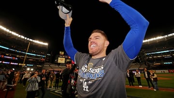 Oct 31, 2024; New York, New York, USA; Los Angeles Dodgers first baseman Freddie Freeman (5) celebrates after the Los Angeles Dodgers beat the New York Yankees in game four to win the 2024 MLB World Series at Yankee Stadium. Mandatory Credit: Brad Penner-Imagn Images
