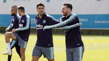 Messi, junto a Luis Suárez, en un entrenamiento de esta semana.