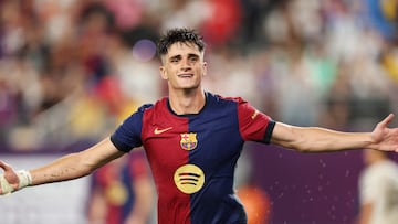 Barcelona's Spanish forward #08 Pau Victor celebrates after scoring a goal during the pre-season club friendly football match between Real Madrid and Barcelona at MetLife Stadium in East Rutherford, New Jersey, August 3, 2024. (Photo by Charly TRIBALLEAU / AFP)