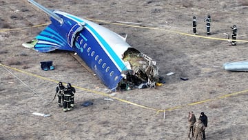 FILE PHOTO: A drone view shows emergency specialists working at the crash site of an Azerbaijan Airlines passenger plane near the city of Aktau, Kazakhstan December 25, 2024. REUTERS/Azamat Sarsenbayev/File Photo