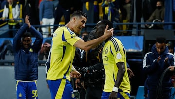 Soccer Football - Saudi Pro League - Al Nassr v Al Fateh - Al-Awwal Park, Riyadh, Saudi Arabia - January 26, 2025 Al Nassr's Cristiano Ronaldo celebrates scoring their third goal with Sadio Mane REUTERS/Hamad I Mohammed
