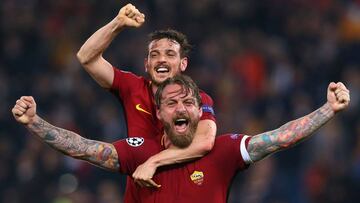 Soccer Football - Champions League Quarter Final Second Leg - AS Roma vs FC Barcelona - Stadio Olimpico, Rome, Italy - April 10, 2018 Roma's Daniele De Rossi and Alessandro Florenzi celebrate after the match REUTERS/Alessandro Bianchi