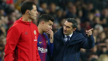 Valverde platicando con Coutinho.