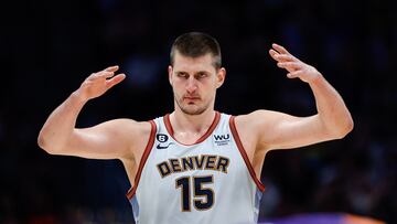 Denver Nuggets center Nikola Jokic (15) gestures in the third quarter against the Phoenix Suns during game five of the 2023 NBA playoffs at Ball Arena.