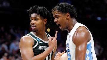 CHARLOTTE, NORTH CAROLINA - MARCH 23: Harrison Ingram #55 of the North Carolina Tar Heels celebrates a play as A.J. Hoggard #11 of the Michigan State Spartans reacts during the first half in the second round of the NCAA Men's Basketball Tournament at Spectrum Center on March 23, 2024 in Charlotte, North Carolina.   Jacob Kupferman/Getty Images/AFP (Photo by Jacob Kupferman / GETTY IMAGES NORTH AMERICA / Getty Images via AFP)