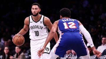 NEW YORK, NEW YORK - OCTOBER 16: Ben Simmons #10 of the Brooklyn Nets is guarded by Tobias Harris #12 of the Philadelphia 76ers during the first quarter of the preseason game at Barclays Center on October 16, 2023 in New York City. NOTE TO USER: User expressly acknowledges and agrees that, by downloading and or using this photograph, User is consenting to the terms and conditions of the Getty Images License Agreement.   Dustin Satloff/Getty Images/AFP (Photo by Dustin Satloff / GETTY IMAGES NORTH AMERICA / Getty Images via AFP)