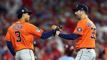 PHILADELPHIA, PENNSYLVANIA - NOVEMBER 03: Jeremy Pena #3 and Justin Verlander #35 of the Houston Astros celebrate after a force out against the Philadelphia Phillies during the fourth inning in Game Five of the 2022 World Series at Citizens Bank Park on November 03, 2022 in Philadelphia, Pennsylvania.   Elsa/Getty Images/AFP