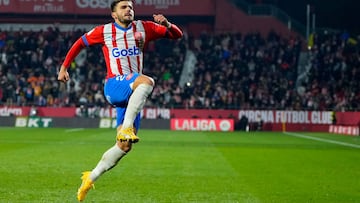 Girona's Spanish forward #24 Cristian Portugues celebrates scoring his team's second goal during the Spanish league football match between Girona FC and Deportivo Alaves at the Montilivi stadium in Girona on December 18, 2023. (Photo by Pau BARRENA / AFP)