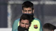 Piqu&eacute; y Messi, durante la sesi&oacute;n de entrenamiento del Bar&ccedil;a.