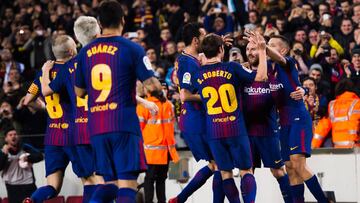 BARCELONA, SPAIN - JANUARY 25: Lionel Messi of FC Barcelona celebrates with teammates after scoring his team's second goal during the Spanish Copa del Rey Quarter Final Second Leg match between FC Barcelona and RCD Espanyol at Camp Nou stadium at Ca
