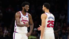 Dec 13, 2019; Philadelphia, PA, USA; Philadelphia 76ers guard Ben Simmons (25) and center Joel Embiid (21) slap hands during the fourth quarter of a game against the New Orleans Pelicans at Wells Fargo Center. Mandatory Credit: Bill Streicher-USA TODAY Sports