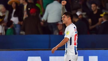 CF Pachuca&#039;s Mexican midfielder Victor Guzman celebrates after scoring a goal against Wydad Casablanca during their FIFA Club World Cup quarter-final match Zayed Sports City Stadium in the Emirati capital Abu Dhabi on December 9, 2017. / AFP PHOTO / 