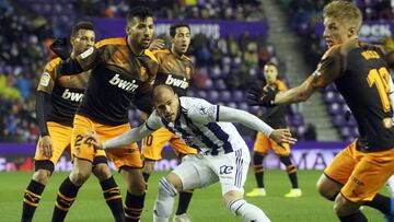 Sandro, Garay y Wass, durante el Valladolid-Valencia.