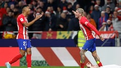 Reinildo y De Paul celebran el triunfo contra el Sevilla.