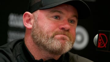 (FILES) Wayne Rooney, Major League Soccer (MLS) All Stars Coach and current DC United Coach, speaks during a Major League Soccer (MLS) All Stars news conference in Washington, DC, on July 18, 2023. Former England international Wayne Rooney is leaving his position as head coach of Major League Soccer's DC United after the team missed out on a spot in the playoffs on October 7, 2023. (Photo by Bastien INZAURRALDE / AFP)