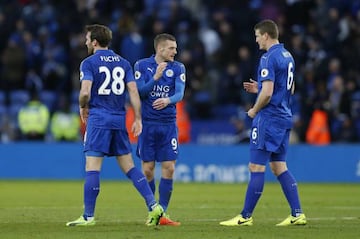 Leicester City's Jamie Vardy, Robert Huth and Christian Fuchs celebrate after the game.