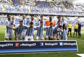 El once inicial del Málaga. De pie: Recio, Albentosa, Miguel Torres, Duje Cop, Kameni y Weligton. Agachados: Camacho, Horta, Juanpi, Rosales y Charles. 
 