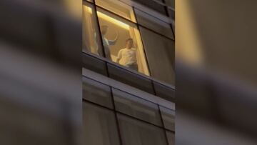 Ahead of Argentina's match against Peru, Lionel Messi's hotel was swarmed with Peru fans and video of him watching them in awe and waving has gone viral.