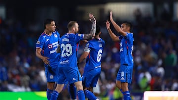 Soccer Football - Liga MX - Cruz Azul v Queretaro - Estadio Olimpico Universitario Mexico 1968, Mexico City, Mexico - September 24, 2025 Cruz Azul players celebrate after Gabriel Fernandez scores their second goal REUTERS/Raquel Cunha