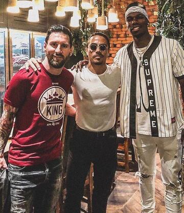 Una foto doble, del día en que La Pulga y Pogba coincidieron en la misma sucursal de este restaurante