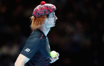 Andy Murray and Roger Federer play in charity match in Glasgow.