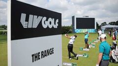 Players practice on the driving range ahead of ahead of the forthcoming LIV Golf Invitational Series event at The Centurion Club in St Albans, north of London, on June 7, 2022. - Former world number one golfer Dustin Johnson confirmed on Tuesday he has resigned his membership of the US PGA Tour to play in the breakaway LIV Golf Invitational Series. The decision effectively rules the American two-time major winner out of participating in the Ryder Cup, which pits the United States against Europe every two years. Six-time major winner Phil Mickelson confirmed on Monday he had also signed up to play in the inaugural LIV event in a major coup for the organisers. (Photo by ADRIAN DENNIS / AFP) (Photo by ADRIAN DENNIS/AFP via Getty Images)